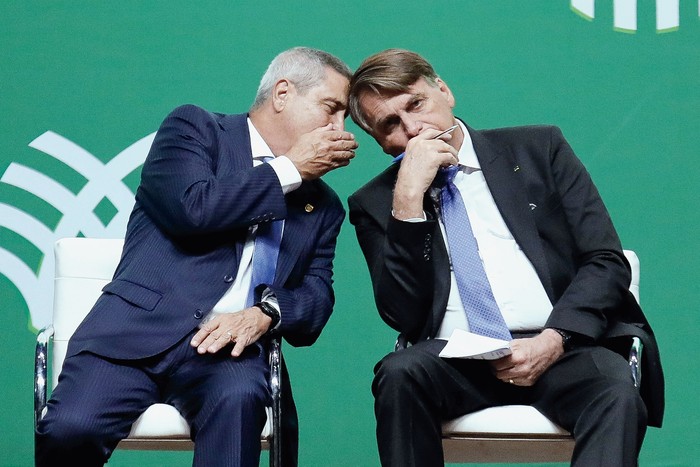 Walter Braga Netto y Jair Bolsonaro durante el Encuentro Nacional de Agricultura en Brasilia, el 10 de agosto de 2022. · Foto: Sergio Lima, AFP