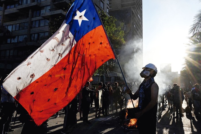 Protesta contra el gobierno de Sebastián Piñera, en Santiago de Chile, el 29 de noviembre de 2019. · Foto: Johan Ordonez, AFP