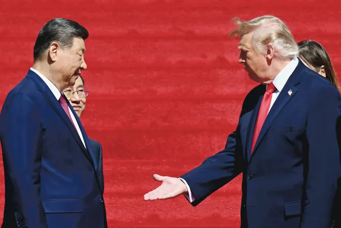 Xi Jinping y Donald Trump durante una visita a los Archivos Nacionales en Washington DC, el 25 de setiembre. · Foto: Saul Loeb, AFP