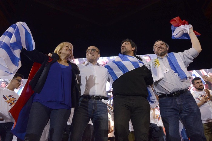 Carolina Cosse, Daniel Martínez, Óscar Andrade y Mario Vergara, en el cierre del Congreso del Frente Amplio.
 · Foto: Alessandro Maradei
