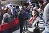 Simpatizantes frenteamplistas aguardan el arribo de amigos y familiares en el puerto de Montevideo. Foto: Alessandro Maradei. Simpatizantes frenteamplistas aguardan el arribo de amigos y familiares en el puerto de Montevideo. Foto: Alessandro Maradei.