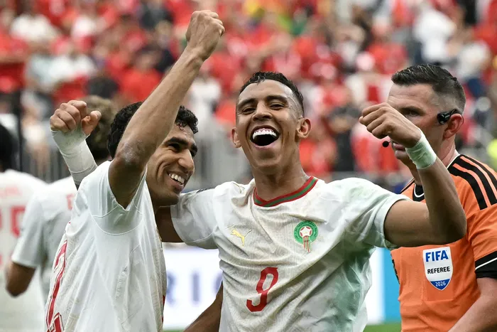 Achraf Hakimi Y Soufiane Rahimi, festejan luego de finalizado el partido ante Canadá, el 4 de julio en Houston. · Foto: Ronaldo Schemidt, AFP