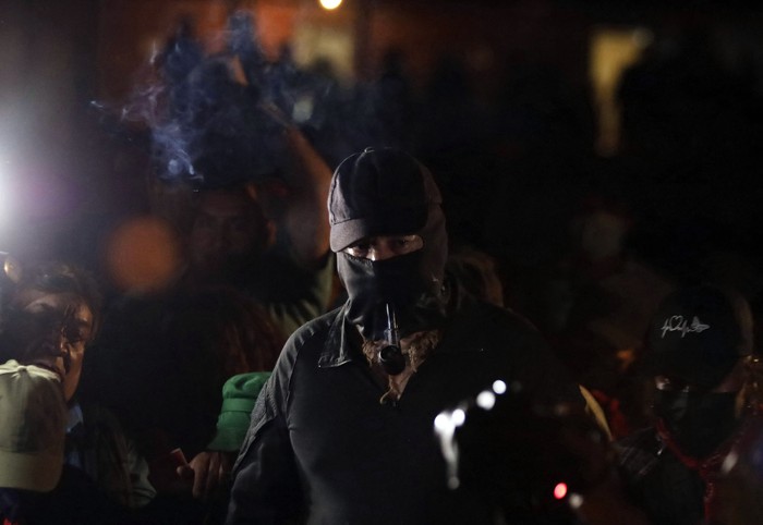 El subcomandante Marcos durante los festejos por el 30º aniversario del levantamiento del Ejército Zapatista de Liberación Nacional, en Chiapas. · Foto: Gerardo Vieyra, Nurphoto, AFP