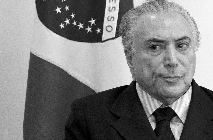 Michel Temer durante la firma del acuerdo de cooperación con la Corte Superior, ayer, en el Palacio de Planalto, en Brasilia. Foto: Andressa Anholete, AFP