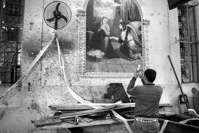 Interior de la iglesia ortodoxa Mar Girgis, ayer, en Tanta, al norte de El Cairo, Egipto. Foto: AFP, s/d de autor