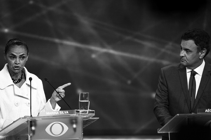 Marina Silva, del Partido Socialista Brasileño, y Aécio Neves, del Partido Social Democracia Brasileña, el martes en el primer debate televisivo organizado por el canal Bandeirantes, en São Paulo (Brasil). / Foto: Sebastião Moreira, Efe