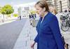 Angela Merkel, canciller alemana, deja la cámara baja del Parlamento, ayer en Berlín.
Angela Merkel, canciller alemana, deja la cámara baja del Parlamento, ayer en Berlín.