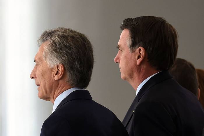 Mauricio Macri y Jair Bolsonaro, ayer, después de la reunión en el Palacio de Planalto en Brasilia. · Foto: Evaristo Sa