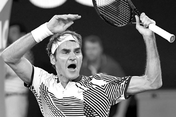El suizo Roger Federer festeja su victoria ante el japonés Kei Nishikori, ayer, en el Abierto de Australia, en Melbourne. Foto: Saeed Khan, AFP