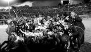 Los jugadores de Nacional festejan la obtención del Torneo Intermedio, ayer, en el estadio Centenario. Foto: Andrés Cuenca