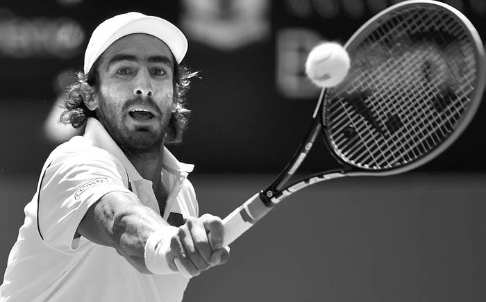 Pablo Cuevas ante el búlgaro Grigor Dimitrov, el 13 de enero en Sydney, Australia. Foto: Peter Parks, Afp