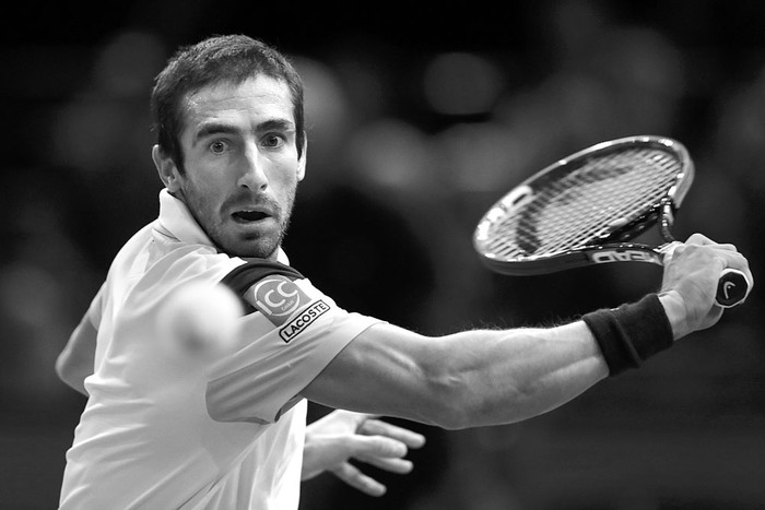 Pablo Cuevas en el partido con Rafael Nadal, ayer, en París. Foto: Thomas Samson, AFP