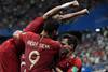 Jugadores de Portugal festejan el primer gol en el partido de ayer ante Irán. Jugadores de Portugal festejan el primer gol en el partido de ayer ante Irán.