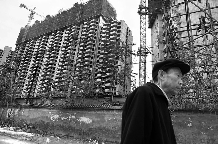 Construcción de edificios de apartamentos en Beijing, China. Foto: Greg Baker, Afp