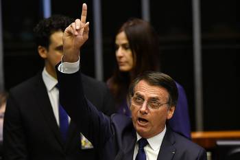 Jair Bolsonaro se dirige al Congreso como nuevo presidente de Brasil, ayer, en Brasilia. Jair Bolsonaro se dirige al Congreso como nuevo presidente de Brasil, ayer, en Brasilia.