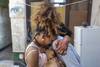 Inmigrantes en una vivienda con amenaza de desalojo en el Centro de Montevideo. · Foto: Ernesto Ryan Inmigrantes en una vivienda con amenaza de desalojo en el Centro de Montevideo. · Foto: Ernesto Ryan