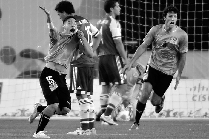 Fernando Gorriarán, de Uruguay, festeja el gol a Paraguay, ayer, en Hamilton, Canadá. Foto: Omar Torres, Afp