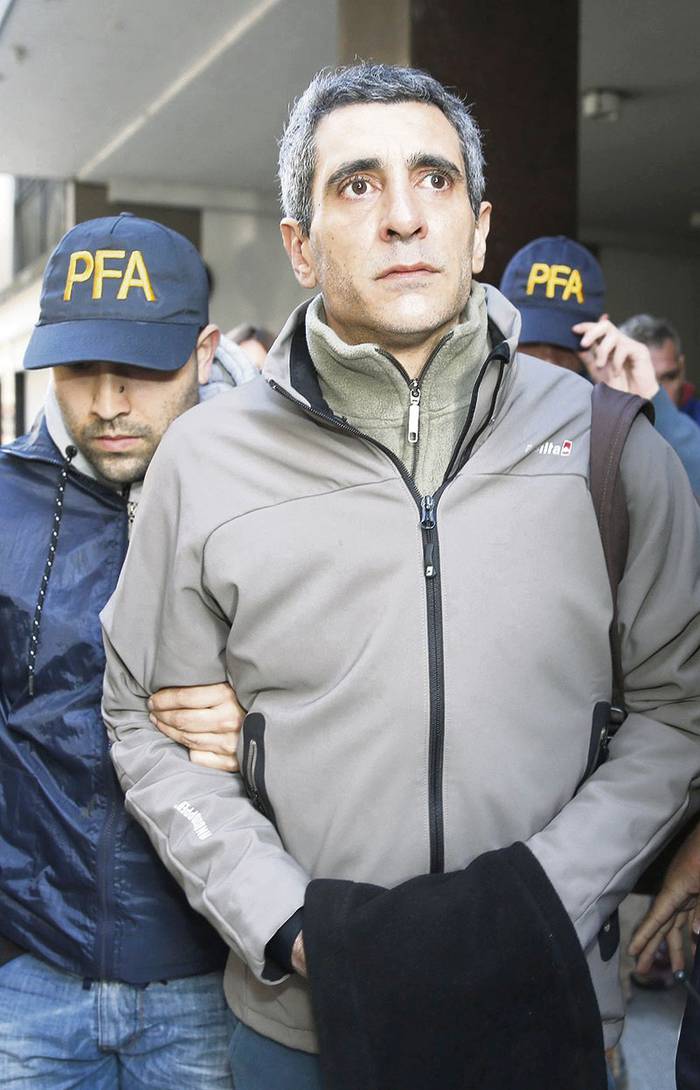 Roberto Baratta, ex secretario de Coordinación del ex ministro de Planificación e Inversión Pública de Argentina, Julio de Vido, tras su arresto en Buenos Aires, el 1º de agosto.
 · Foto: Ricardo Pristupluk