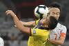 Andrés Chicaiza de Ecuador, y Gaku Shibasaki, de Japón, ayer, en el estadio Mineirao en Belo Horizonte, Brasil. · Foto: Luis Acosta, AFP Andrés Chicaiza de Ecuador, y Gaku Shibasaki, de Japón, ayer, en el estadio Mineirao en Belo Horizonte, Brasil. · Foto: Luis Acosta, AFP