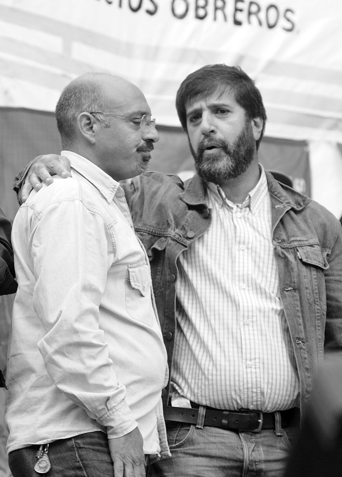 Marcelo Abdala y Fernando Pereira, coordinadores del PIT-CNT, en un acto de la Central.Foto: Sandro Pereyra (archivo, abril de 2015)