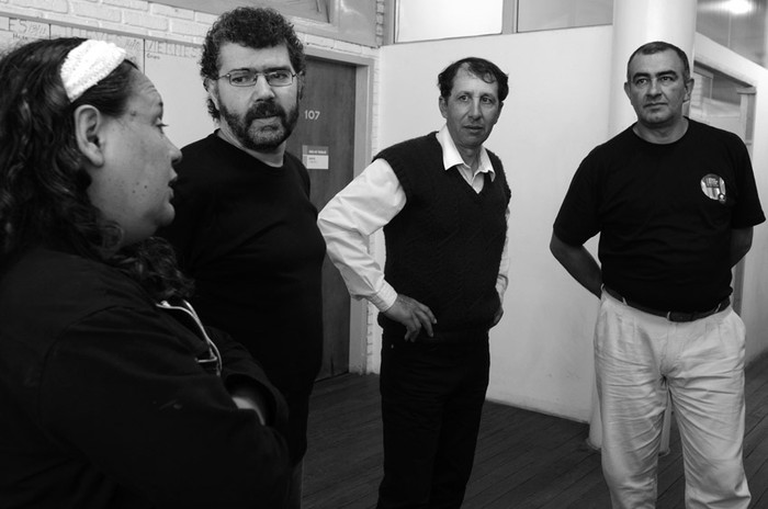 María Flores, Antonio Rammauro, Wilber de los Santos y César Rodríguez, ayer, en la Dirección Nacional de Trabajo (Dinatra). · Foto: Pablo Vignali