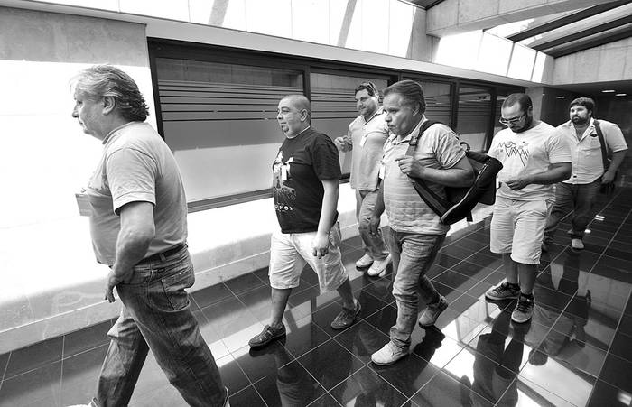 Trabajadores del Molino Dolores asisten, ayer, a la Comisión de Legislación del Trabajo de Diputados. Foto: Federico Gutiérrez