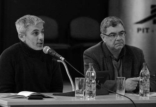 Pablo da Rocha y Milton Castellanos, ayer, surante la presentación del informe de coyuntura del Instituto Cuesta Duarte, en la sede del PIT-CNT. · Foto: Nicolás Celaya