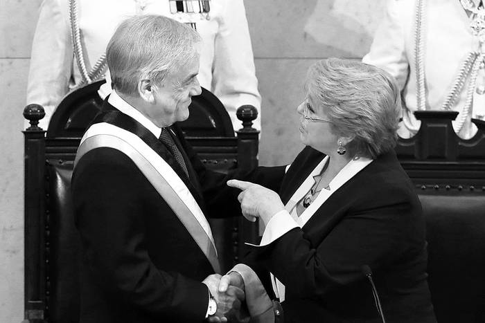 Sebastián Piñera y Michelle Bachelet, ayer, en el Congreso, en Valparaíso, Chile. Foto: Claudio Reyes, AFP