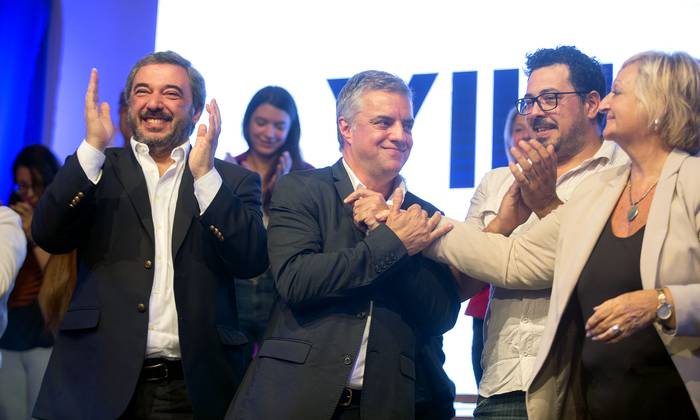 Mario Bergara, Álvaro Villar, Alejandro Sánchez y Liliam Kechichian, ayer, en el Museo del Carnaval. · Foto: .