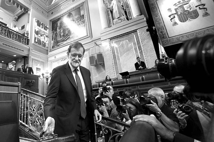Mariano Rajoy ocupa su lugar en el Congreso de los Diputados, ayer, en Madrid. Foto: Curto De La Torre, AFP