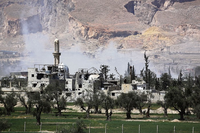 Tierras agrícolas en las afueras de Duma, mientras soldados del ejército sirio avanzan contra el bastión rebelde de Guta, ayer, en Siria.
