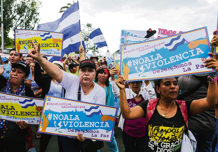 Partidarios del presidente nicaragüense Daniel Ortega marchan en su apoyo, en Managua, el miércoles 2 de
mayo. Foto: Inti Ocon, AFP · Foto: Inti Ocon