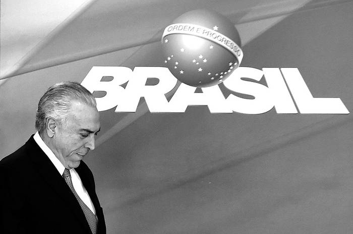 Michel Temer asiste a una conferencia de prensa en el Palacio del Planalto, en Brasilia, ayer. Foto: Evaristo Sa, AFP