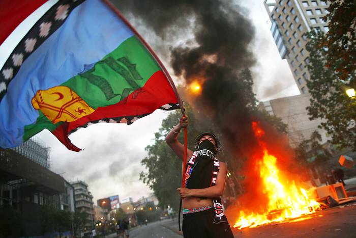 Protestas en Santiago, el 25 de octubre.  · Foto: Pablo Vera, AFP