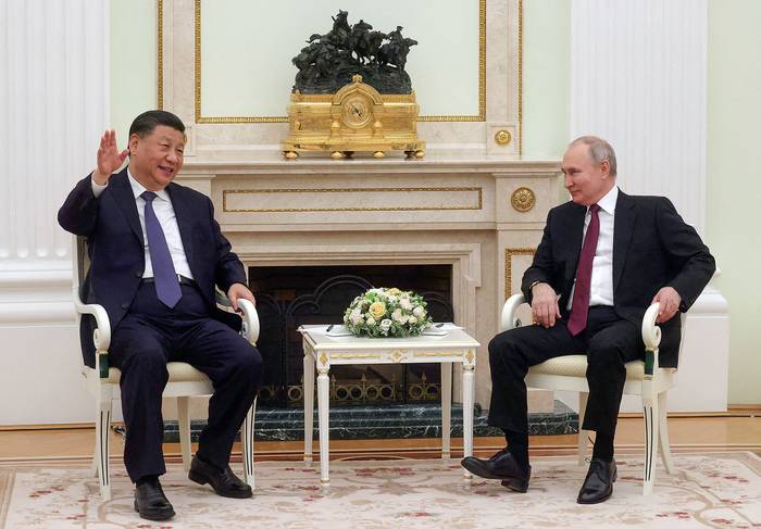 El presidente chino, Xi Jinping, y su par ruso, Vladimir Putin, en el Kremlin, en Moscú (20.03.2023). · Foto: Sergei Karpukhin, Sputnik, AFP