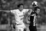 Alejandro Martinuccio y Rodrigo Muñoz, durante el clásico.