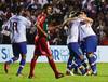 Jugadores de Nacional y Diego Scotti, de Boston River, ayer, tras el gol de Christian Oliva. Foto: Pablo Vignali · Foto: Pablo Vignali Jugadores de Nacional y Diego Scotti, de Boston River, ayer, tras el gol de Christian Oliva. Foto: Pablo Vignali · Foto: Pablo Vignali