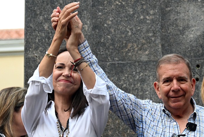 El candidato presidencial venezolano Edmundo González Urrutia y la líder opositora María Corina Machado durante una manifestación con fieles cristianos, el 21 de julio, en Caracas. · Foto: Raúl Arboleda, AFP